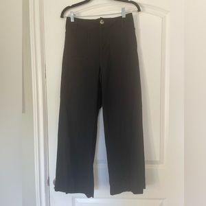 Maeve Anthropologie cropped Colette black wide leg pants. Size 27